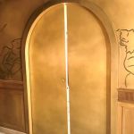 Porte arrondie salle VIP du restaurant Siena en patine faux-bronze